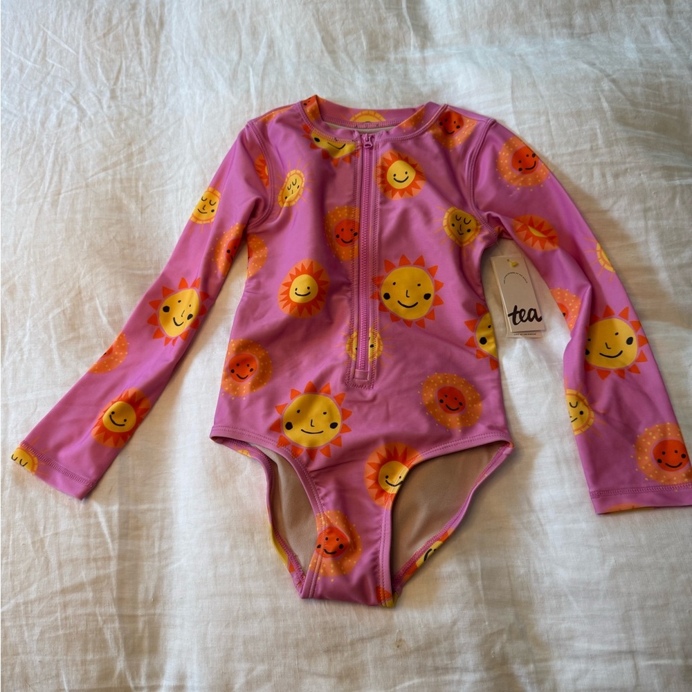 Tea Collection Pink and Yellow Sunburst Long Sleeve Swimsuit